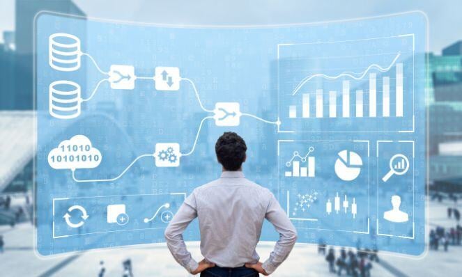 Person looking at a board with graphic drawings of KPIs in front of him.