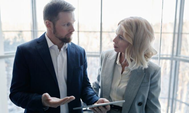 Workmates talking to each other.