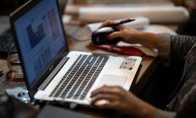 Person working on their laptop.