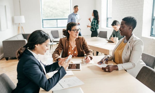 Team working on a strategy for HubSpot migration.