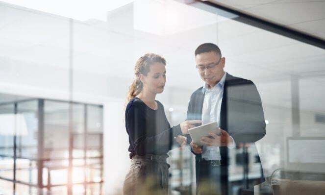 Workmates working together.