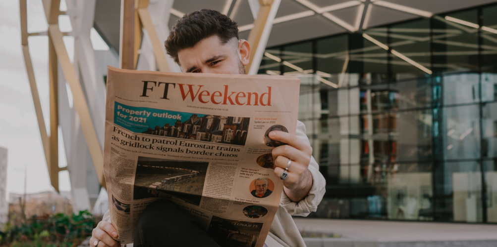 man reading newspaper